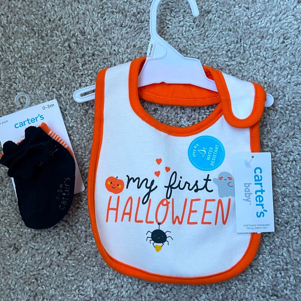 BRAND NEW carters bib and socks. First Halloween